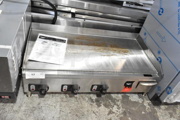 Brand new Vollrath Cayenne FTA 8036 stainless steel 36" electric griddle, thermostatic control, 220V, slight scratches.