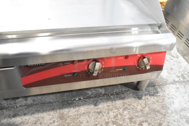 Avantco 177EG24N stainless steel flat top griddle, new with minor scratches, features power and heating controls, 208/240V.