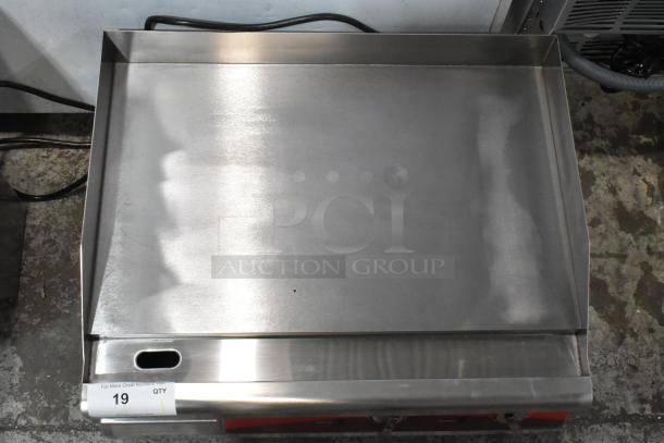 Brand new Avantco 177EG24N stainless steel countertop electric griddle, 208/240V, with minor scratches.