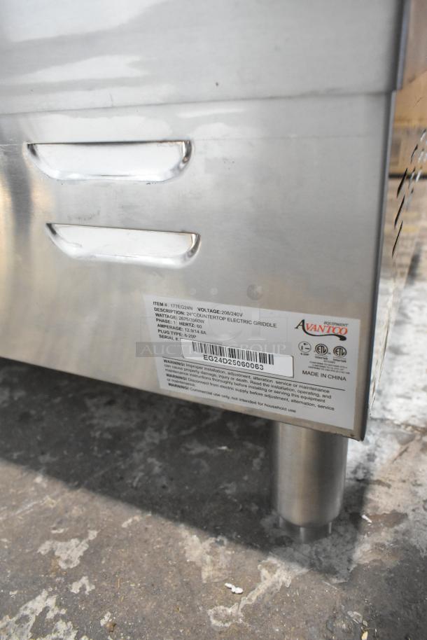Brand new Avantco 177EG24N stainless steel countertop griddle with scratch and dent, 208/240V, electric powered.
