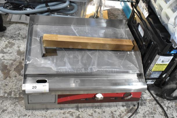 Brand new Avantco 177EG24N stainless steel countertop griddle, electric powered, 208/240 volts, with minor scratches and dents.
