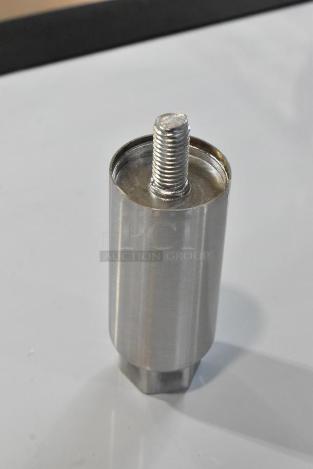 Alt text: Metal cylindrical part with threaded top, likely a component for assembly or repair.