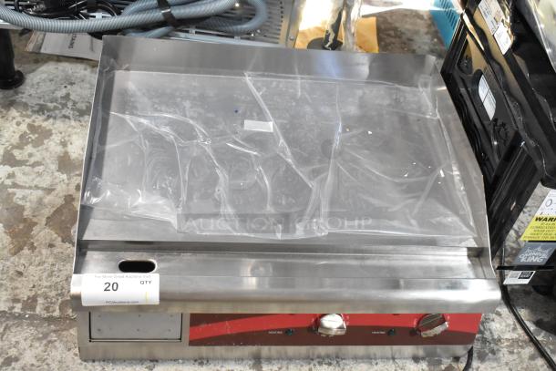 Avantco 177EG24N stainless steel electric countertop griddle, brand new scratch and dent, 208/240 volts, clear protective cover.