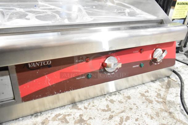 Brand new Avantco 177EG24N stainless steel electric countertop griddle, 208/240V, showing scratch and dent marks.