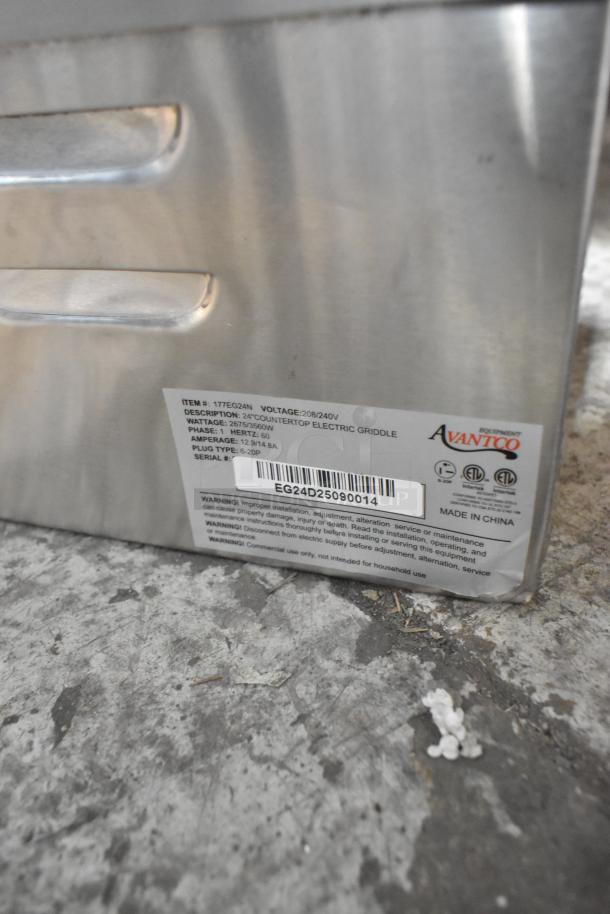 Brand new Avantco 177EG24N stainless steel commercial flat top griddle, 208/240V, with minor scratches and dents.