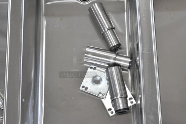 Stainless steel components of ServIt 423EST5WSFB steam table, shiny finish, new condition, commercial use.