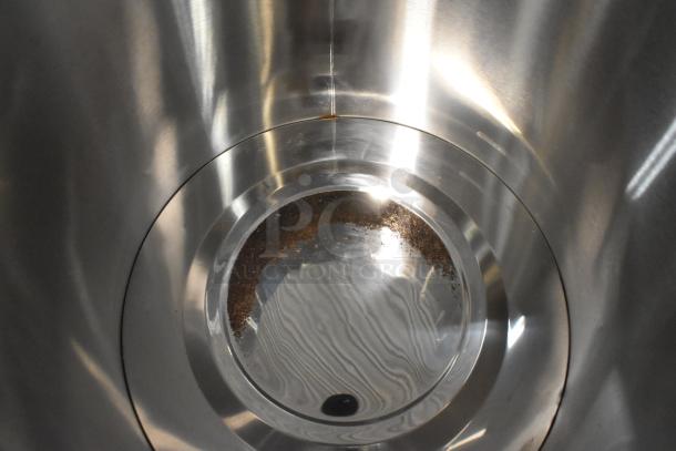 Brand new Avantco 177WB19L water boiler interior, 5-gallon capacity, scratch and dent condition, visible sediment on base.