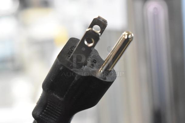 Close-up of a power plug for the Avantco 177WB19L water boiler. The plug is a standard 120-volt type.