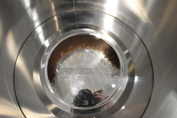 Interior view of an Avantco 177WB19L water boiler showing minor scratches and debris. Brand new, 5-gallon capacity, 120V.