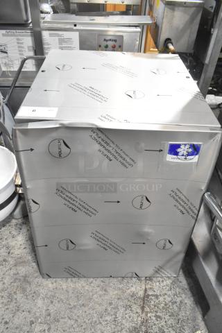 Brand new 2025 Manitowoc RFP0620A-161, 22" flake ice machine, 682 lb capacity, stainless steel, visible scratches and dents.