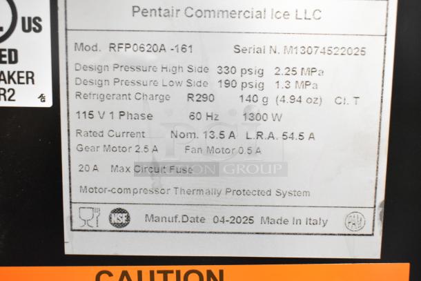 Label on Manitowoc RFP0620A-161 flake ice machine shows specs: 115V, 1-Phase, R290 refrigerant, 682 lb capacity, made in Italy.