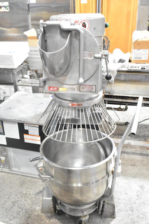 2021 Precision HD-60 Metal 60 Quart Planetary Dough Mixer with Pelican head, mixing bowl, dough hook, and bowl dolly.