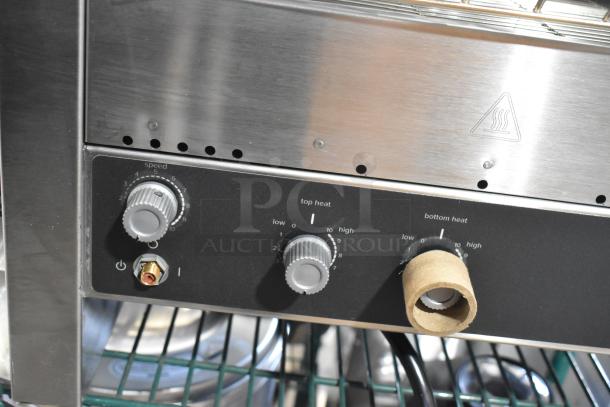 BRAND NEW Vollrath JT3H stainless steel conveyor toaster, 1 1/2"-3" opening, 208V, 1 Phase, control knobs shown.