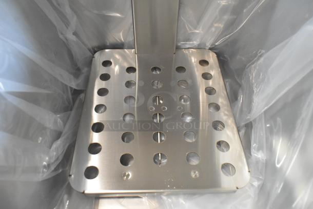 Stainless steel interior of a 2025 Vollrath CF2-1800 countertop deep fryer, brand new condition, with protective wrapping.