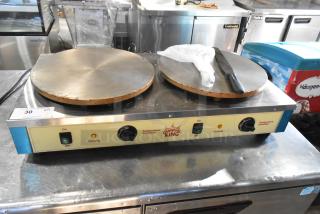 Brand new Carnival King 382CM16DBL dual crepe maker, stainless steel, 16" plates, slight scratches. 208/240V, 1 Phase.