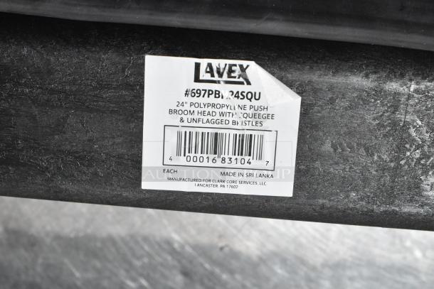 Lavex 24" push broom head label showing SKU 697PBH24SQU, with squeegee and unflagged bristles, made in Sri Lanka.