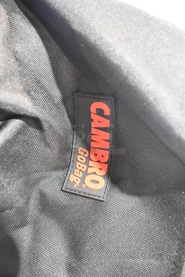 Cambro GoBag® tag inside black insulated delivery bag, highlighting brand identity.