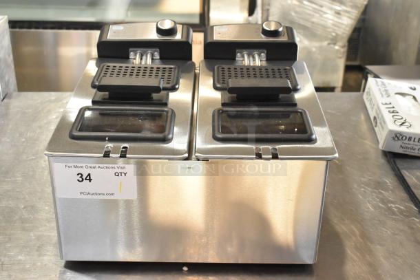 Brand new Pukomc MPS130DL-1 metal countertop deep fat fryer, 2 bay, 120 volts, 1 phase, slight scratches visible.