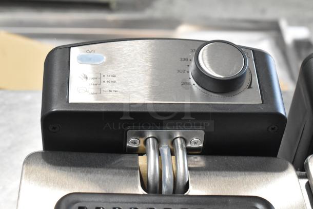 BRAND NEW SCRATCH AND DENT Pukomc MPS130DL-1 Metal 2 Bay Deep Fat Fryer, 120V, 1 Phase, with control panel detail.