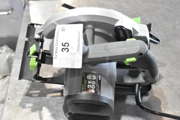 Genesis GCS130 circular saw, 13A, 7-1/4" blade, 120V, brand new with minor scratches. Model label visible.