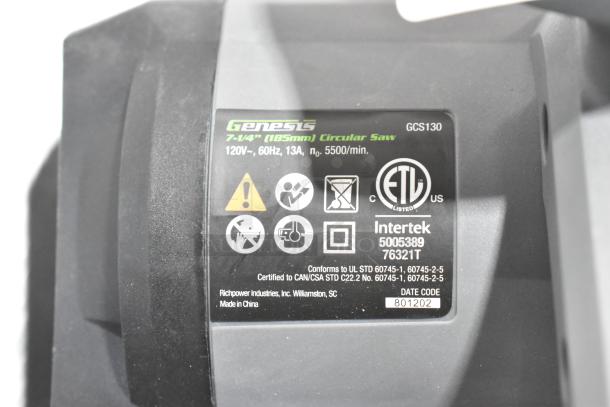 Genesis GCS130 Circular Saw, 7-1/4" blade, 120V, new with scratches and dents. ETL listed, model and safety labels visible.
