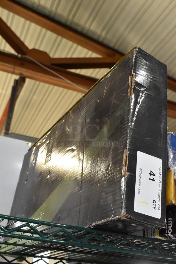 Box with Regency 600PRW814 wall-mounted pre-rinse faucet, labeled, showing signs of wear.