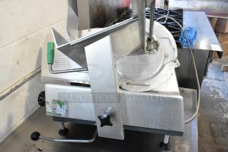 Bizerba GSP HD metal commercial meat slicer, 120V, 1 phase, showing controls and slicer blade. Good condition.