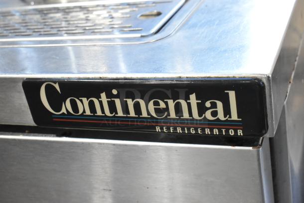 Continental stainless steel commercial kegerator with beer tower, locked door, on casters. 115 volts, 1 phase.