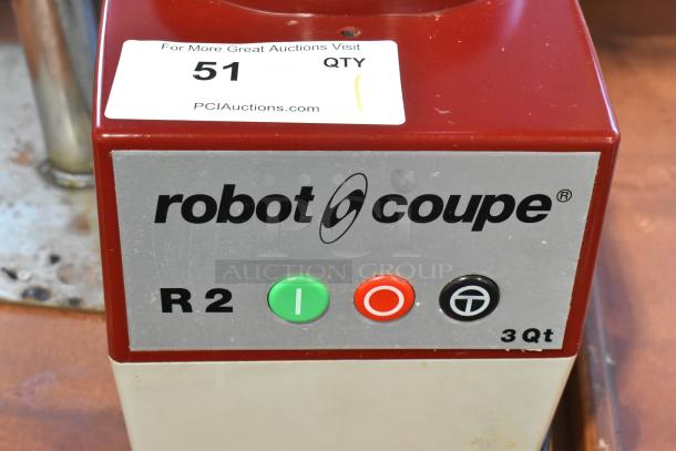 Robot Coupe R2N food processor base, 120V, 1 Phase, visible buttons and brand label. Model R2N indicated on the unit.