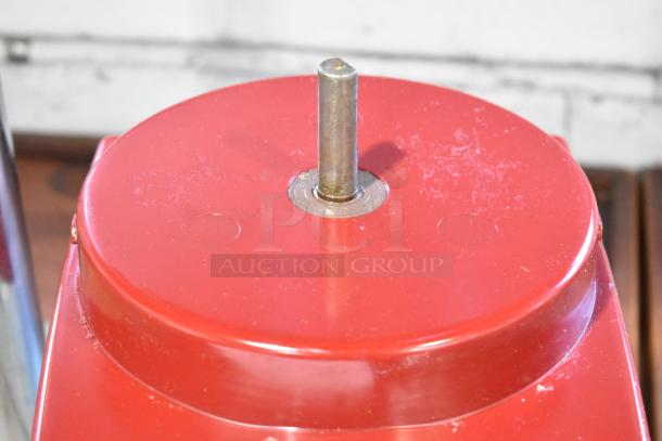 Robot Coupe R2N food processor base, red, 120V, 1-phase, metal shaft, good condition, slight wear visible.
