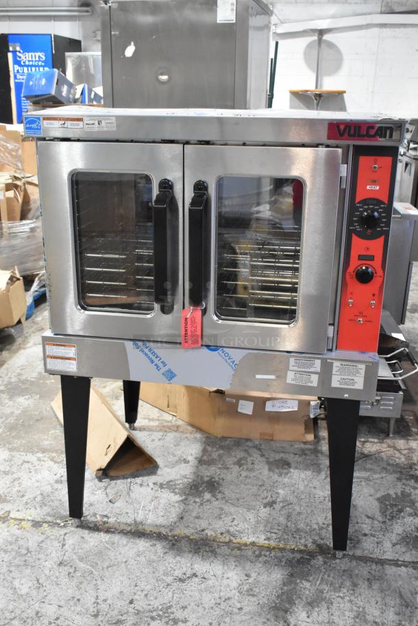 Brand new Vulcan VC5ED stainless steel commercial convection oven, view-through doors, metal racks, thermostatic controls, 208V, 3/1 phase.
