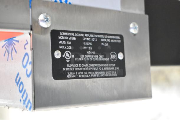 Label on Vulcan VC5ED stainless steel convection oven shows model, volts, and certification marks.