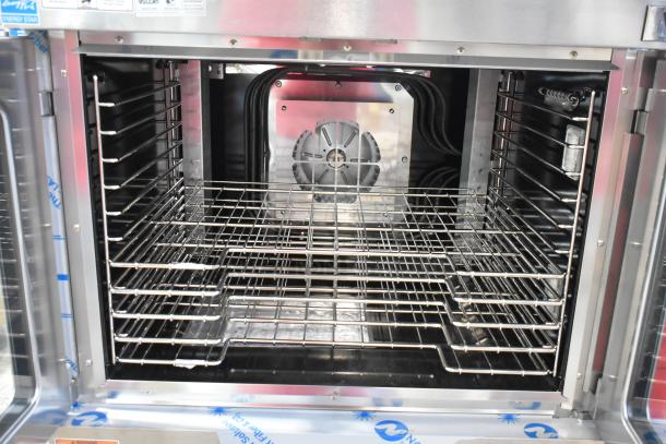 Brand new Vulcan VC5ED convection oven, stainless steel, thermostatic controls, metal racks, view-through doors, 208V, 3/1 phase.