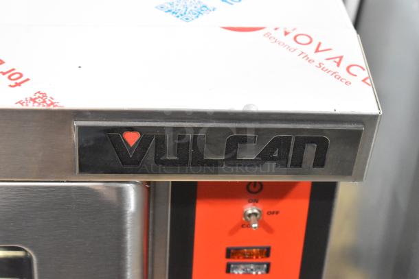 Brand new Vulcan VC4ED stainless steel convection oven, with scratch and dent, view-through doors, metal racks, 208V.