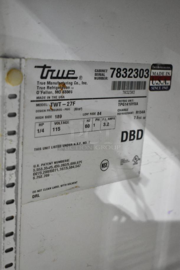 True TWT-27F undercounter freezer, stainless steel, 115V, 1 phase, model label, NSF certified, serial number 7832303.