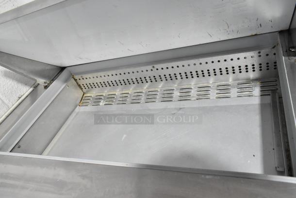 2024 Continental SW48N18M stainless steel prep table interior, showing clean, durable surface and ventilation details.