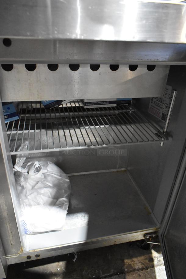 2024 Continental SW48N18M stainless steel prep table, interior view, clean condition, commercial casters, 115V, 1 Phase.