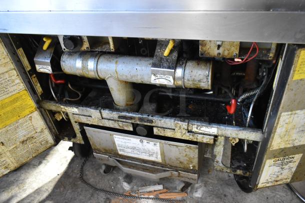 2019 Frymaster SCFSM250GN stainless steel commercial fryer; dual bay; natural gas; 120,000 BTU; signs of use.
