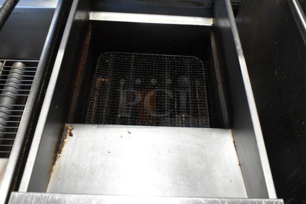 2018 Pitco Frialator SG14 stainless steel commercial deep fryer, natural gas, 110,000 BTU, with three metal fry baskets.