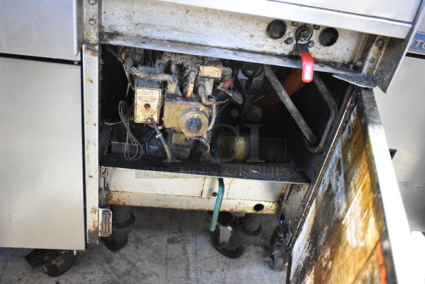 Pitco Frialator SSPG14 stainless steel pasta cooker, showing used interior components. Natural gas-powered, on casters. 60,000 BTU.