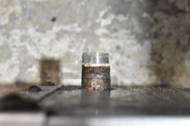 Montague Stainless Steel Commercial Charbroiler Grill valve, showing gas connection, slightly rusted.