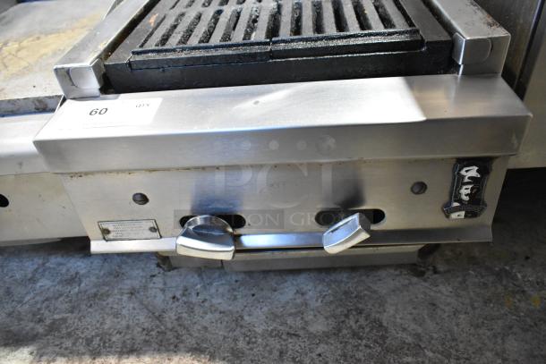 Montague stainless steel commercial countertop gas charbroiler grill, featuring dual control knobs and a robust grill surface.