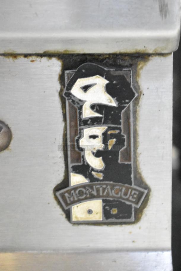 Montague stainless steel commercial charbroiler grill with brand logo; used condition.