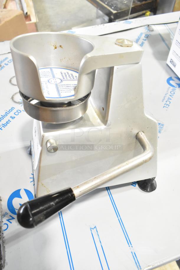 2018 Univex 1404 Metal PattyPress Burger Mold, 4", manual, countertop model, visible wear, silver finish.