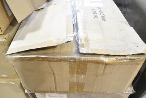 6 sealed boxes containing General Electric GE H5SM and Dual Lite LED emergency lights. Boxes appear slightly worn.