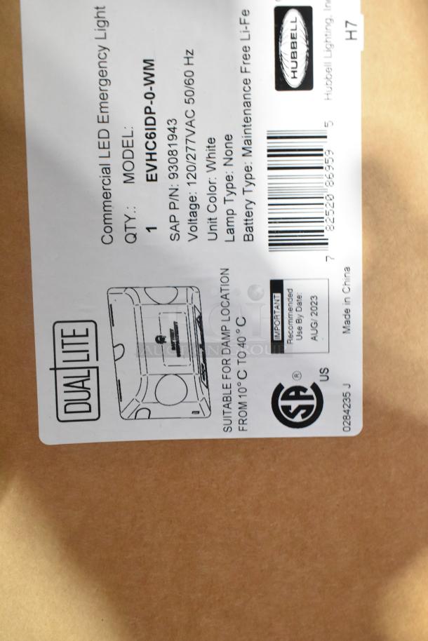 Dual Lite LED Emergency Light box showing model EVHC6IDP-0-WM, voltage 120/277V, white color, made in China.