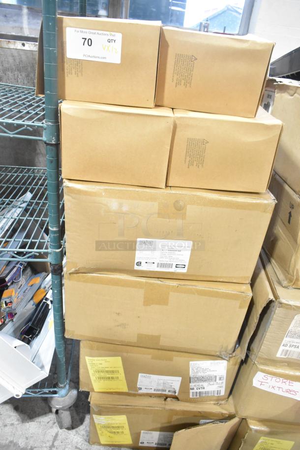 12 new boxes with Dual Lite EVHCEZP Emergency Light Back Box and Dual Lite LED Emergency Light. Includes labels and markings.