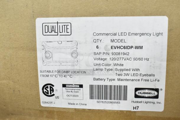 Alt text: Box label for Dual Lite EVHC6IDP-WM commercial LED emergency light. Details include model, voltage, white color, and maintenance-free Li-Fe battery. Suitable for damp locations.