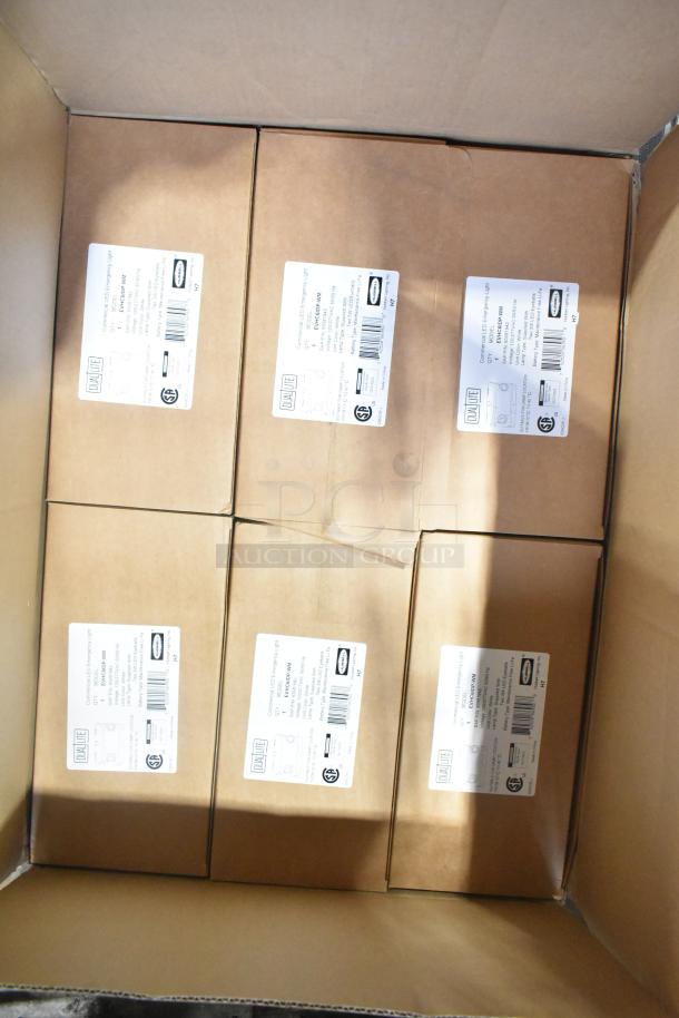 12 brand new boxes of Dual Lite EVHCEZP LED emergency lights, labeled for condition and specifications.