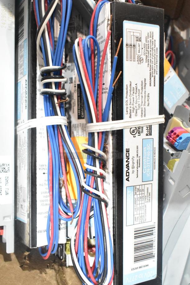 Lot of various ballasts including multiple wire configurations. Labels show Advance by Signify, model ICN-2P60-SC. Suitable for lighting fixtures.